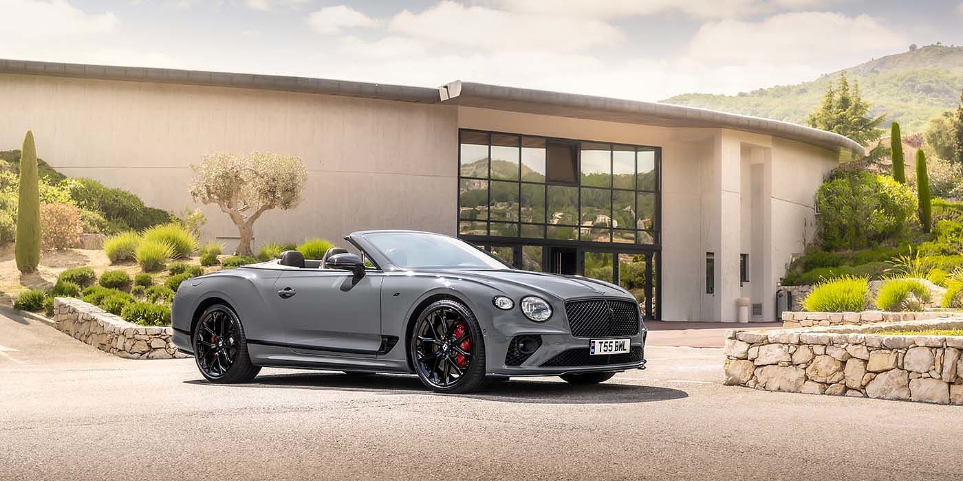 Bentley Hatfield Bentley Continental GTC S convertible in Cambrian Grey paint front 34 static near house