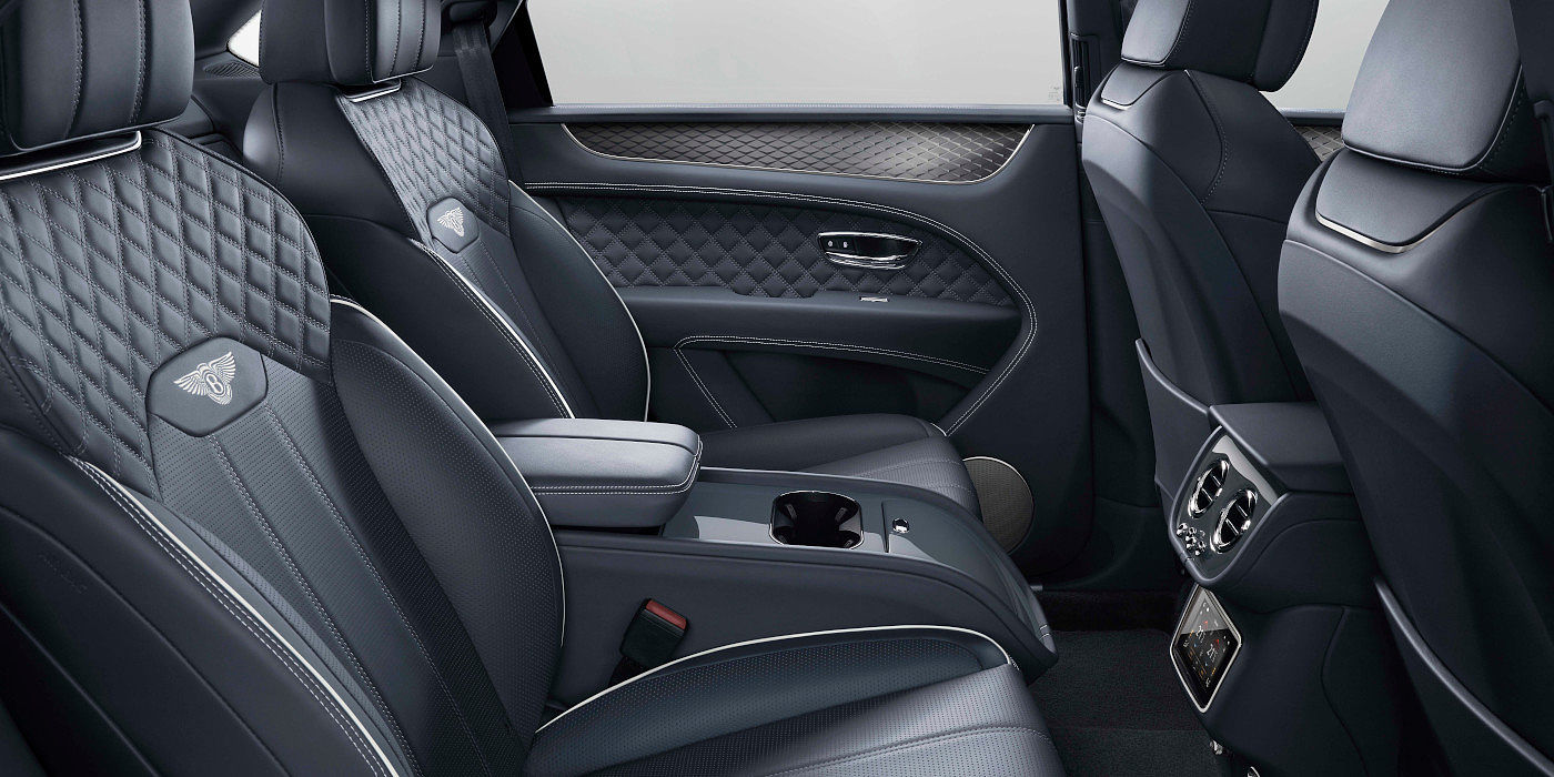 new-bentley-bentayga-hybrid-rear-interior-in-brunel-blue-leather-and-brushed-aluminium-veneer