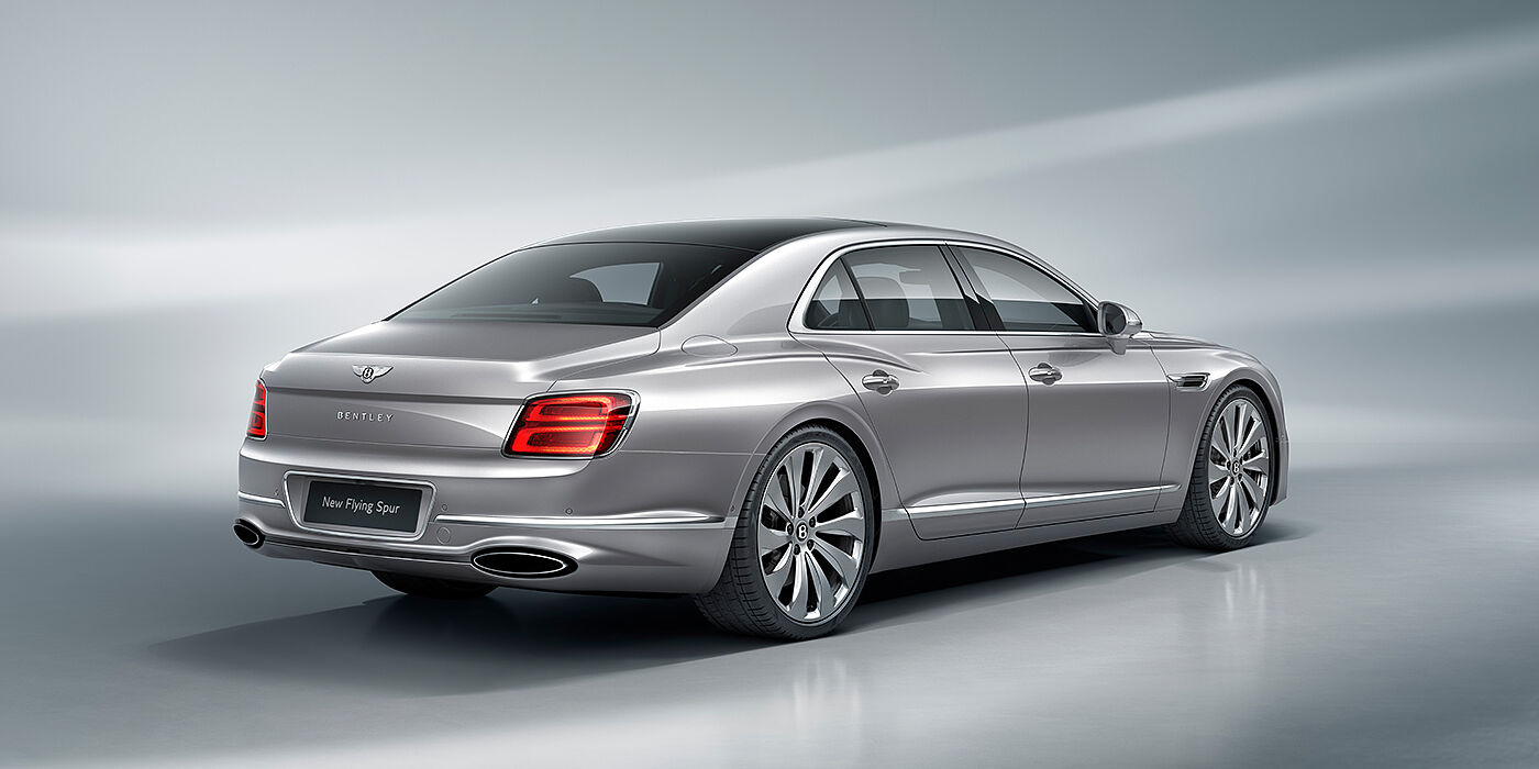 Bentley Hatfield New Bentley Flying Spur sedan rear view in Silverlake paint with ten spoke wheels and chrome matrix grille