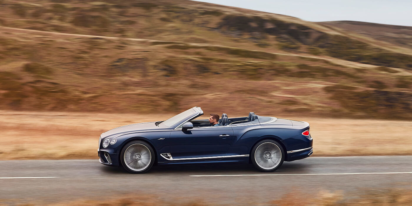 new-bentley-continental-gt-speed-convertible-in-peacock-blue-profile-in-peak-district