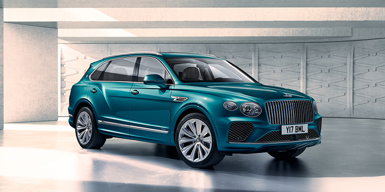 Bentley Hatfield Bentley Bentayga Extended Wheelbase Azure SUV front three quarter in Topaz blue paint colour with a grey background