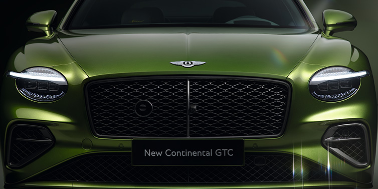 Bentley Hatfield Bentley Continental GTC Speed convertible front bonnet detail in Tourmaline Green paint showing new light design