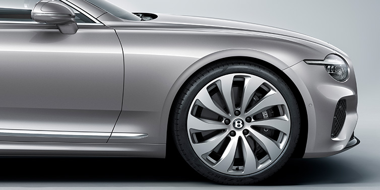 Bentley Hatfield New Bentley Continental GT coupe side view featuring bonnet in Silverlake paint and 22 inch ten spoke silver painted and bright machined wheel