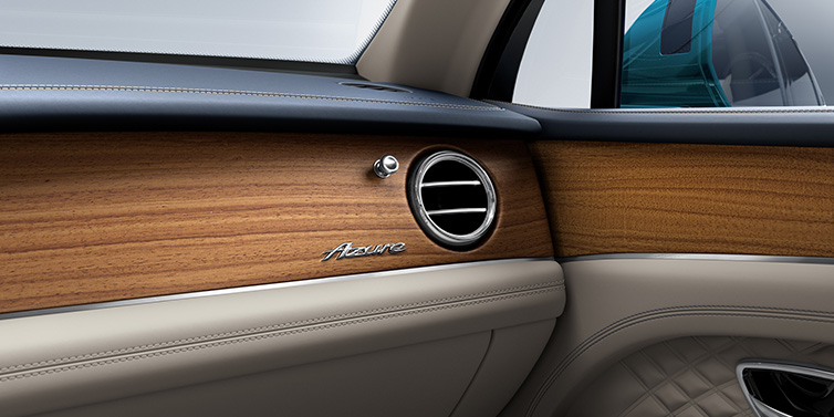 Bentley Hatfield Bentley Bentayga Extended Wheelbase Azure front dash showing Open Pore Koa veneer surrounded by Portland and Imperial Blue hides