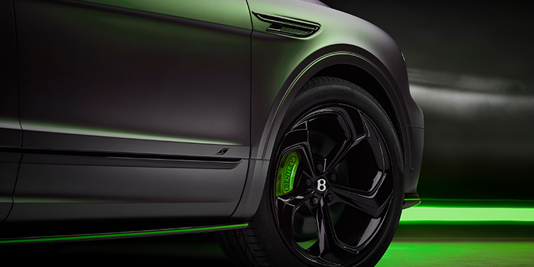 Bentley Hatfield Bentley Bentayga S Black Edition SUV exterior wheel detail with Cyber Green brakes with Anthracite Satin paint